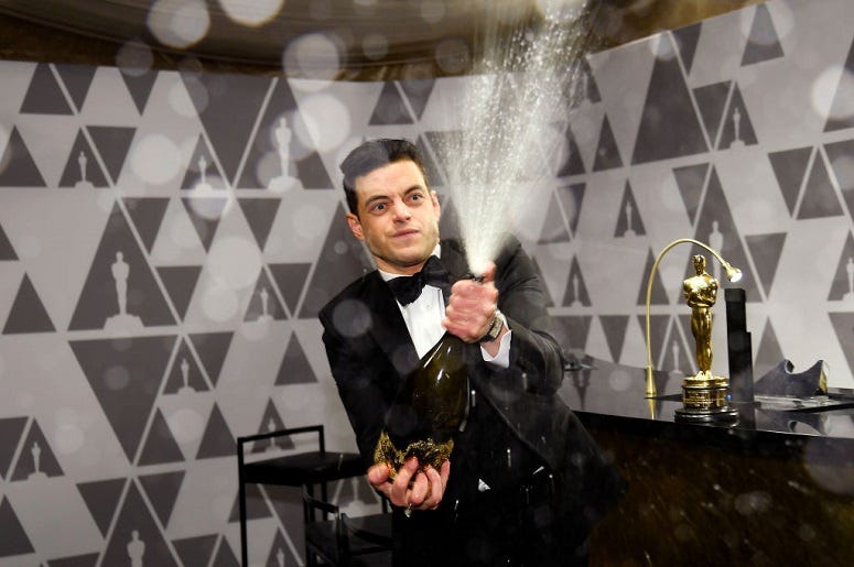 Rami Malek sprays champagne during the 91st Annual Academy Awards Governors Ball