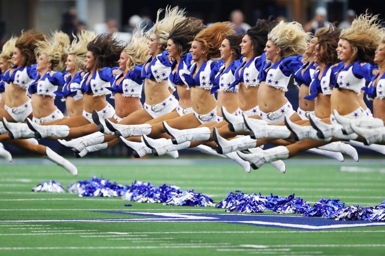 The Dallas Cowboys cheerleaders perform during the game between the New York Giants and the Dallas Cowboys at AT&T Stadium on September 08, 2019 in Arlington, Texas. The Dallas Cowboys cheerleaders perform during the game between the New York Giants and the Dallas Cowboys at AT&T Stadium on September 08, 2019 in Arlington, Texas.
