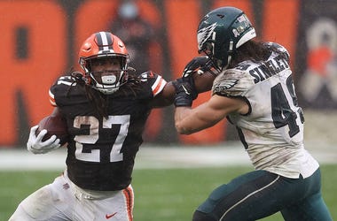 Kareem Hunt is pursued by Alex Singleton during the second half at FirstEnergy Stadium on November 22, 2020