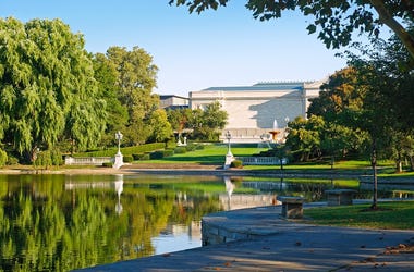 The Cleveland Museum of Art and trees reflected in Wade Lagoon, Cleveland Ohio