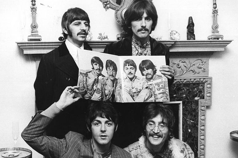 The Beatles (clockwise from top left: Ringo Starr, George Harrison (1943 - 2001), John Lennon (1940 - 1980) and Paul McCartney) pose for a photocall to promote their new album 'Sergeant Pepper's Lonely Hearts Club Band'. The Beatles (clockwise from top left: Ringo Starr, George Harrison (1943 - 2001), John Lennon (1940 - 1980) and Paul McCartney) pose for a photocall to promote their new album 'Sergeant Pepper's Lonely Hearts Club Band'.