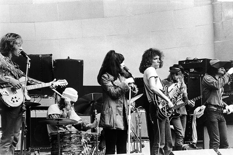 L-R: Guitarist Paul Kantner, drummer Spencer Dryden, singer Grace Slick, guitarist Jorma Kaukonen, bassist Jack Casady, singer Marty Balin.
