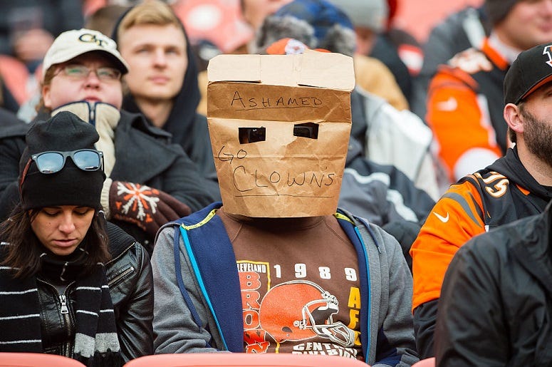 A Cleveland Browns fan expresses their disappointment with the team during the second half against the Cincinnati Bengals