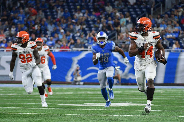 Cleveland Browns defensive end Nate Orchard (44) runs for a touchdown after making an interception during the second quarter against the Detroit Lions at Ford Field Cleveland Browns defensive end Nate Orchard (44) runs for a touchdown after making an interception during the second quarter against the Detroit Lions at Ford Field