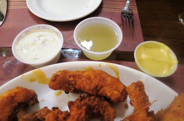 Chicken tenders are served with a trio of dipping sauces including ranch and honey mustard, but the standout is the house-made duck sauce (center), much clearer and less orangey than that found in many Chinese restaurants. It is delicious, popular, and so