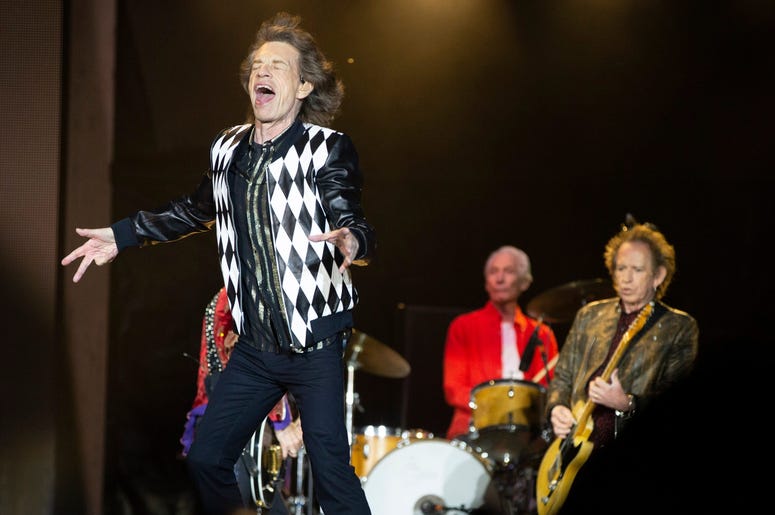 Lead singer Mick Jagger of the Rolling Stones performs at Soldier Field in Chicago Lead singer Mick Jagger of the Rolling Stones performs at Soldier Field in Chicago