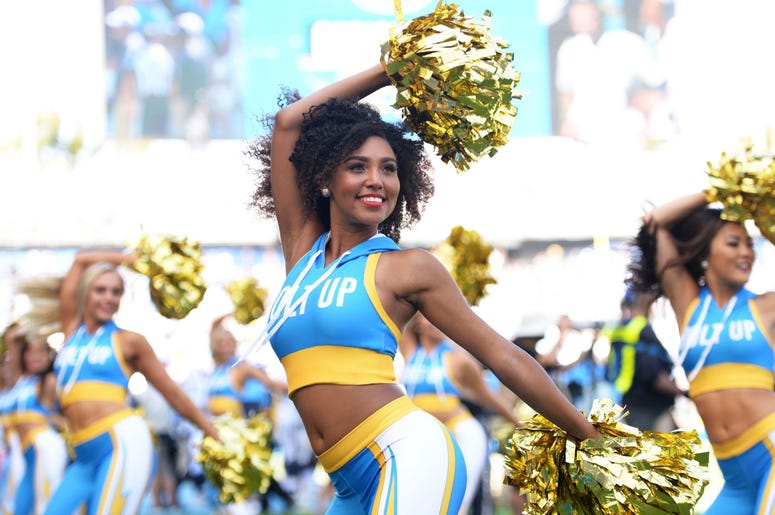 The Los Angeles Chargers cheerleaders cheer during the fourth quarter against the Indianapolis Colts at Dignity Health Sports Park. The Los Angeles Chargers cheerleaders cheer during the fourth quarter against the Indianapolis Colts at Dignity Health Sports Park.