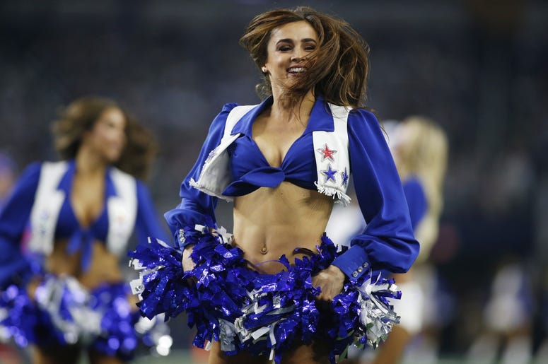 Dallas Cowboys cheerleader performs during a time out in the game against the Buffalo Bills at AT&T Stadium. Dallas Cowboys cheerleader performs during a time out in the game against the Buffalo Bills at AT&T Stadium.