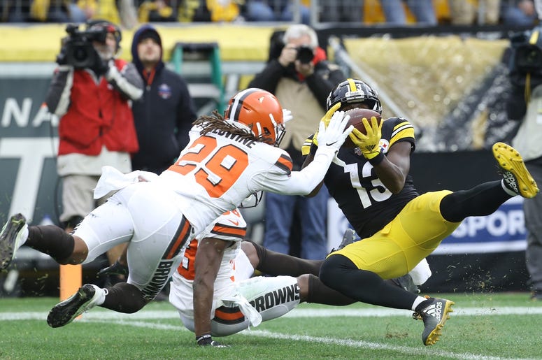 Pittsburgh Steelers wide receiver James Washington (13) catches a touchdown pass against Cleveland Browns defensive back T.J. Carrie (rear) and defensive back Sheldrick Redwine (29) during the second quarter at Heinz Field. Pittsburgh Steelers wide receiver James Washington (13) catches a touchdown pass against Cleveland Browns defensive back T.J. Carrie (rear) and defensive back Sheldrick Redwine (29) during the second quarter at Heinz Field.