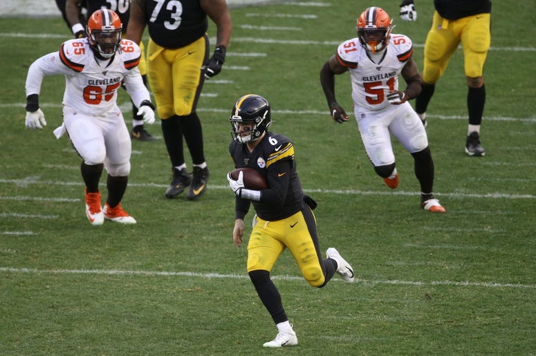Pittsburgh Steelers quarterback Devlin Hodges (6) caries the ball for a first down against the Cleveland Browns during the third quarter at Heinz Field. The Steelers won 20-13. Pittsburgh Steelers quarterback Devlin Hodges (6) caries the ball for a first down against the Cleveland Browns during the third quarter at Heinz Field. The Steelers won 20-13.