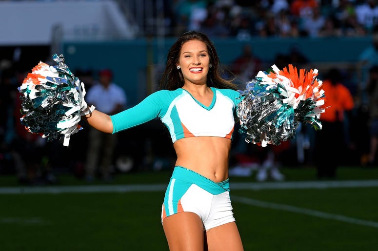 Miami Dolphins cheerleader performs during the second half against the Philadelphia Eagles at Hard Rock Stadium. Miami Dolphins cheerleader performs during the second half against the Philadelphia Eagles at Hard Rock Stadium.