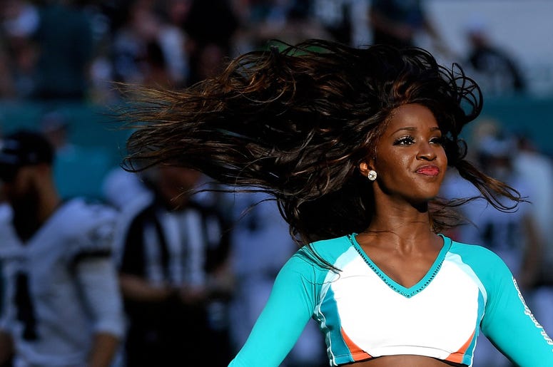 Miami Dolphins cheerleader performs during the second half against the Philadelphia Eagles at Hard Rock Stadium. Miami Dolphins cheerleader performs during the second half against the Philadelphia Eagles at Hard Rock Stadium.