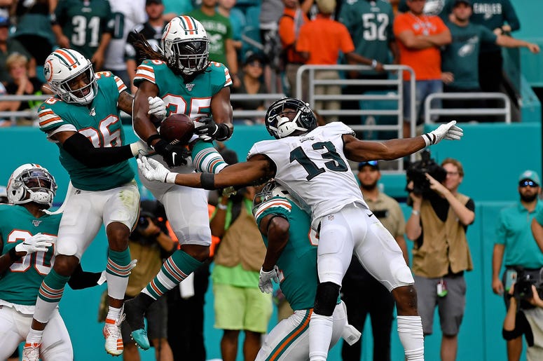 Dec 1, 2019; Miami Gardens, FL, USA; Philadelphia Eagles wide receiver Nelson Agholor (13) is unable to make a catch as Miami Dolphins free safety Adrian Colbert (36) and Miami Dolphins defensive back Walt Aikens (35) defends the play during the second ha