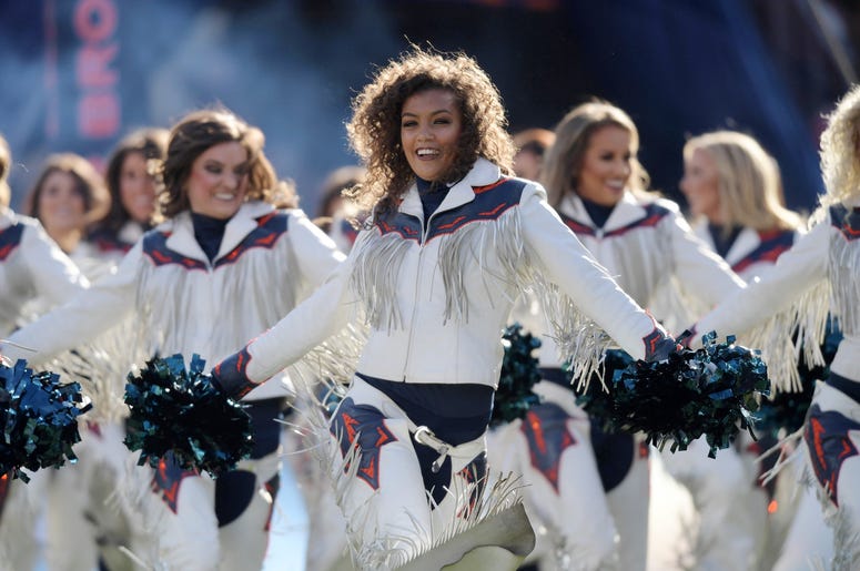 Denver Broncos cheerleaders perform in the first half against the Los Angeles Chargers at Empower Field at Mile High. Denver Broncos cheerleaders perform in the first half against the Los Angeles Chargers at Empower Field at Mile High.