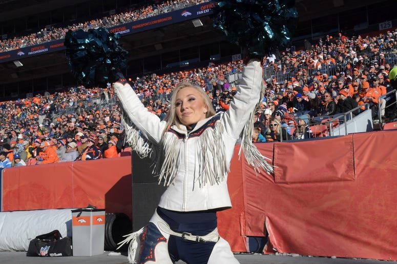 Denver Broncos cheerleaders perform in the first half against the Los Angeles Chargers at Empower Field at Mile High. Denver Broncos cheerleaders perform in the first half against the Los Angeles Chargers at Empower Field at Mile High.