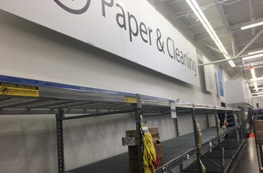 Vacant shelves where toilet paper used to be. Img 2828