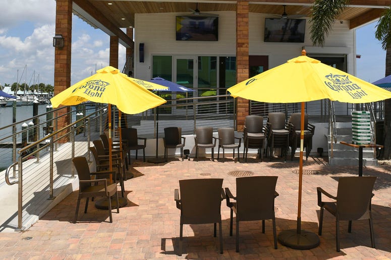 Customers arrive for lunch at the new Crabby's Dockside restaurant just after they opened for lunch on Monday, July 6, 2020, at the Fort Pierce City Marina. The new $1.4 million restaurant first opened their doors on June 25, and opened for their full lun