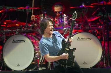 February 22, 2012; Indianapolis, IN, USA; Eddie Van Halen plays a solo at Bankers Life Fieldhouse during the set of Van Halen, Indianapolis, Wednesday, February 22, 2012. Mandatory Credit: Robert Scheer-USA TODAY NETWORK