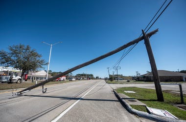 A fallen utility pole lays across U.S. Highway 90 in Bay St. Louis, Miss. as a result of Hurricane Zeta Thursday, Oct. 29, 2020. Sdw 7239