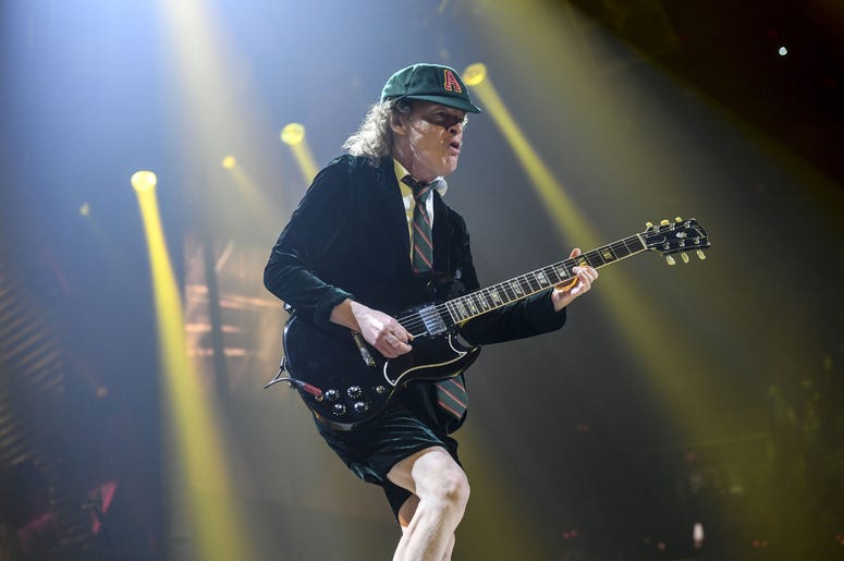 Angus Young performs Angus Young performs
