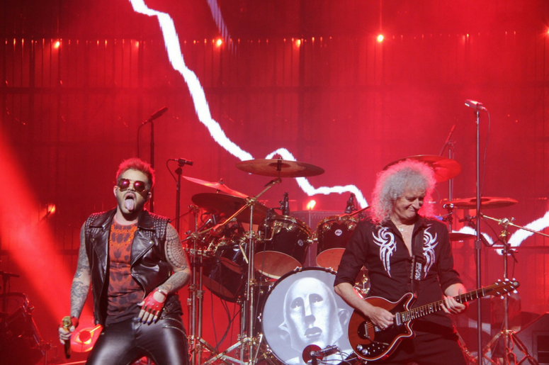 The Story Behind Queen + Adam Lambert