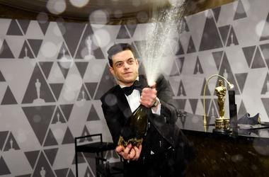 Rami Malek sprays champagne during the 91st Annual Academy Awards Governors Ball