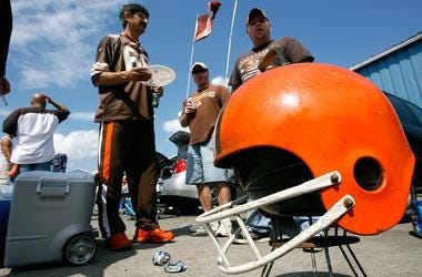 Fans tailgate before the game