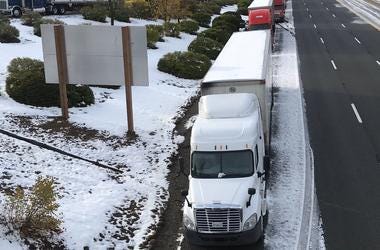 Truckers parked on the side of northbound I-5 because they say there s no room for them at the truck stops. Snow 2