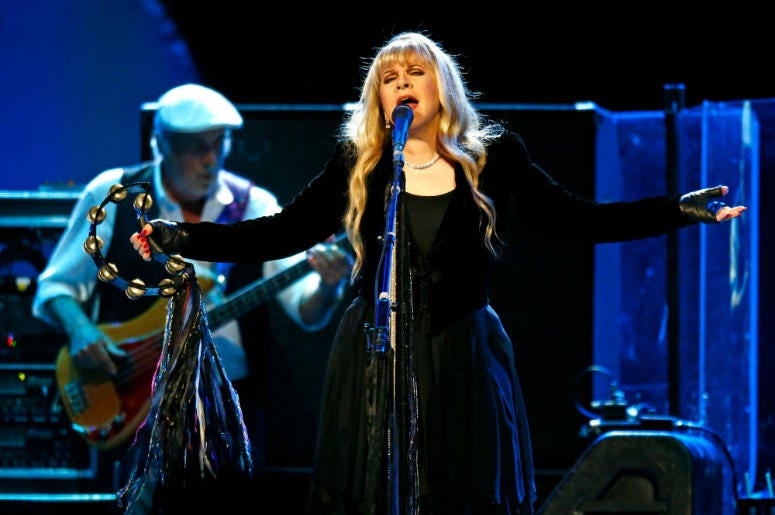 Fleetwood Mac's Stevie Nicks and bassist John McVie perform May 30, 2013 Fleetwood Mac's Stevie Nicks and bassist John McVie perform May 30, 2013