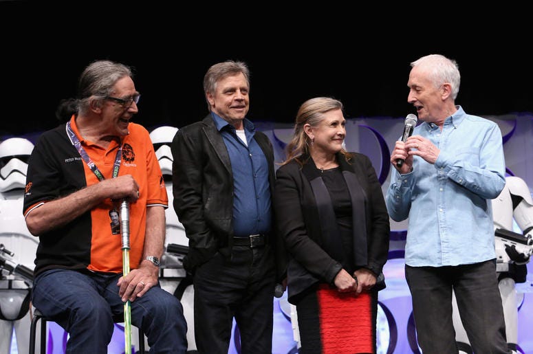 (L-R) Actors Peter Mayhew, Mark Hamill, Carrie Fisher and Anthony Daniels speak onstage during Star Wars Celebration 2015 (L-R) Actors Peter Mayhew, Mark Hamill, Carrie Fisher and Anthony Daniels speak onstage during Star Wars Celebration 2015
