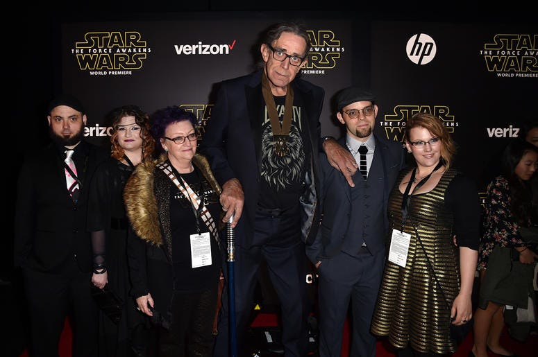 Actor Peter Mayhew (C) and family attend the World Premiere of "Star Wars: The Force Awakens" Actor Peter Mayhew (C) and family attend the World Premiere of "Star Wars: The Force Awakens"