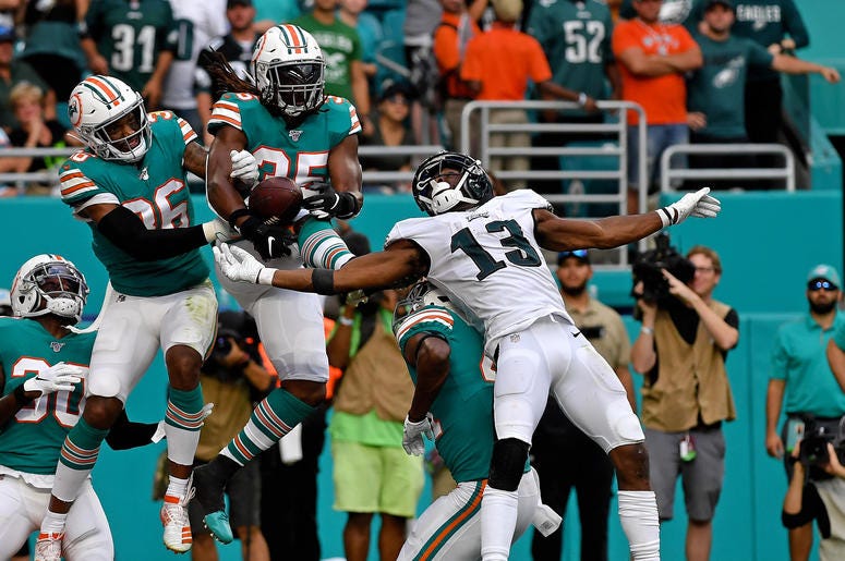 Dec 1, 2019; Miami Gardens, FL, USA; Philadelphia Eagles wide receiver Nelson Agholor (13) is unable to make a catch as Miami Dolphins free safety Adrian Colbert (36) and Miami Dolphins defensive back Walt Aikens (35) defends the play during the second ha