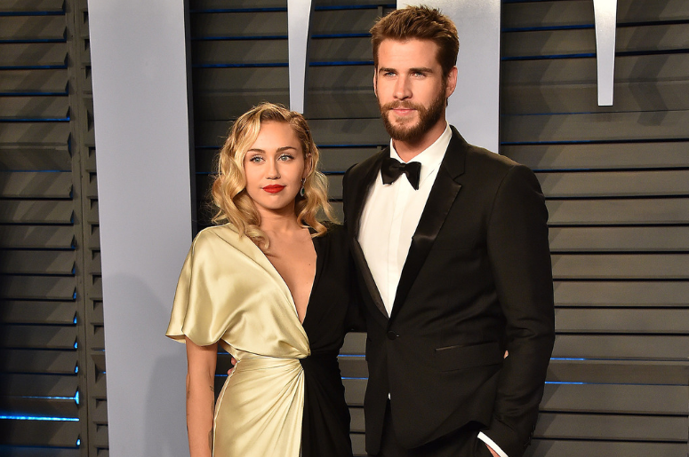 Miley Cyrus (L) and actor Liam Hemsworth arrives at the 2018 Vanity Fair Oscar Party Miley Cyrus (L) and actor Liam Hemsworth arrives at the 2018 Vanity Fair Oscar Party