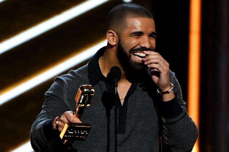 Drake Recording artist Drake accepts the Top Billboard 200 Album award for 'Views' onstage during the 2017 Billboard Music Awards at T-Mobile Arena on May 21, 2017 in Las Vegas, Nevada.