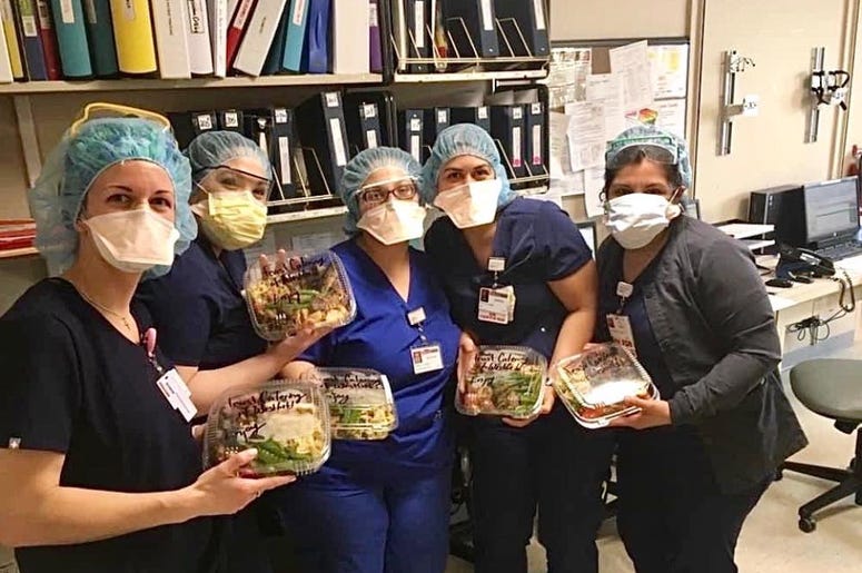 nurses holding salads nurses holding salads