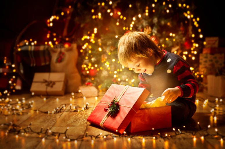kid opening a present kid opening a present