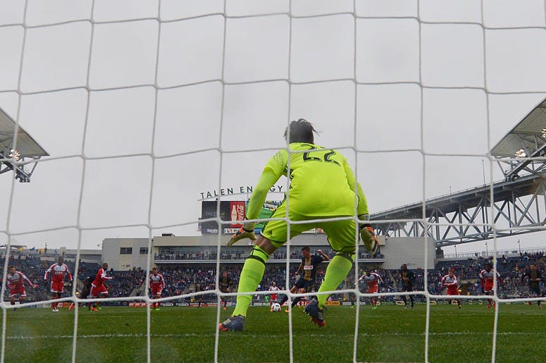 Sebastien Le Toux #9 of Philadelphia Union takes a penalty shot on Bobby Shuttleworth #22 of New England Revolution at Talen Energy Stadium on March 20, 2016 in Chester, Pennsylvania. The Union won 3-0.