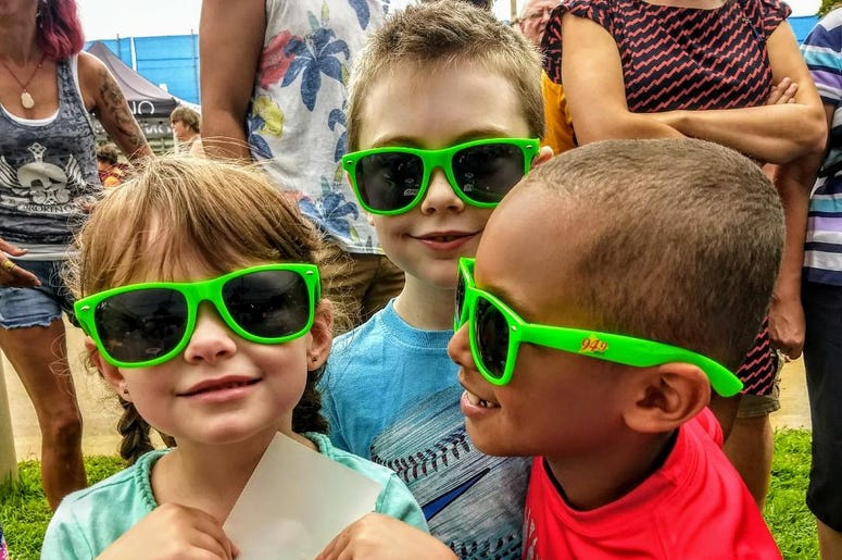 Kids wearing their WOLX summer shades Kids wearing their WOLX summer shades