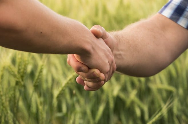 Man makes good on 1992 handshake promise