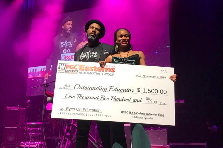 Andrea Hoes was awarded with $1500 for being an outstanding educator. Andrea Hoes was awarded with $1500 for being an outstanding educator.