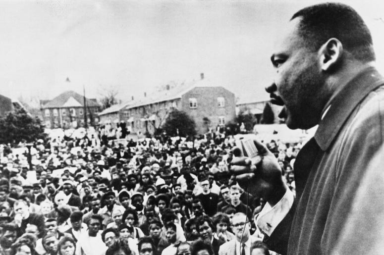 Dr. Martin Luther King Jr. Speaking In Front Of Crowd