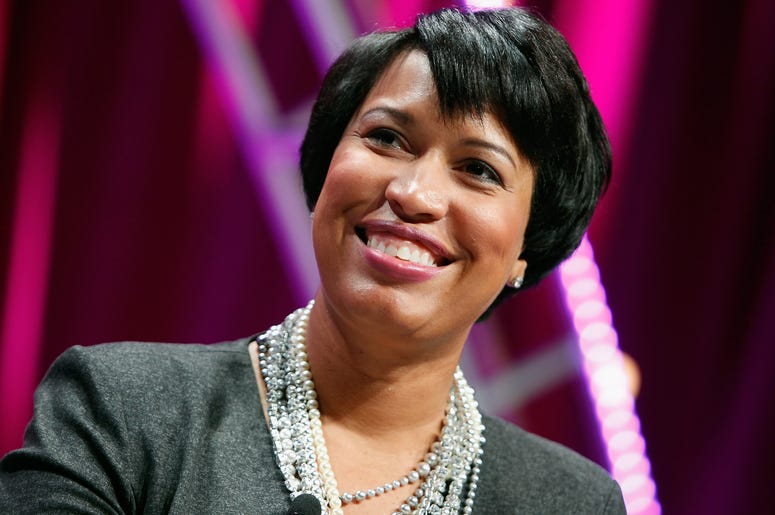 Mayor Murial Bowser unveils Family Success Centers in Wards 7 and 8. Mayor Murial Bowser poses smiling.