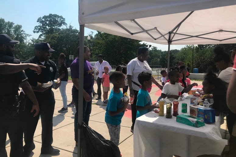 National Night Out emphasized collaboration between police and the community. National Night Out emphasized collaboration between police and the community.