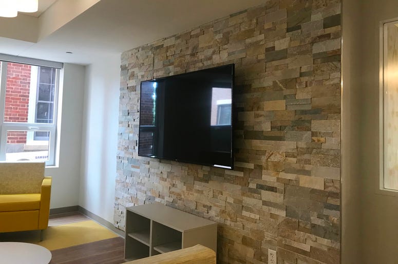 Mayor Muriel Bowser cut the ribbon on a brand new short-term family housing facility. Mayor Muriel Bowser cut the ribbon on a brand new short-term family housing facility.