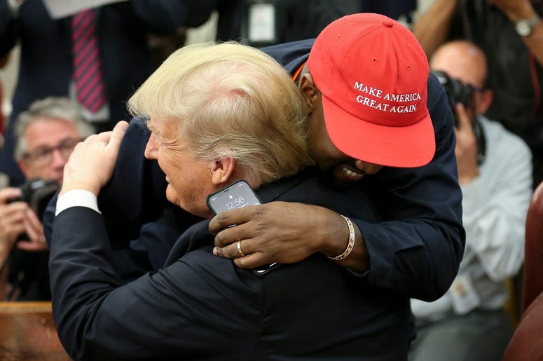 Donald Trump hugs Kanye West Donald Trump hugs Kanye West