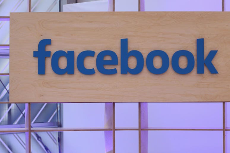 The Facebook logo is displayed at the Facebook Innovation Hub on February 24, 2016 in Berlin, Germany. (Photo by Sean Gallup/Getty Images) Facebook logo