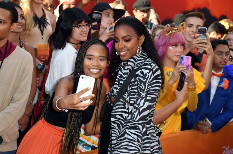 Kelly Rowland spports at 'Lion King' premiere. Kelly Rowland spports at 'Lion King' premiere.
