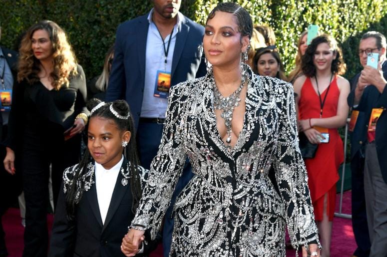 Beyonce and Blue Ivy strut down the red carpet. Beyonce and Blue Ivy strut down the red carpet.