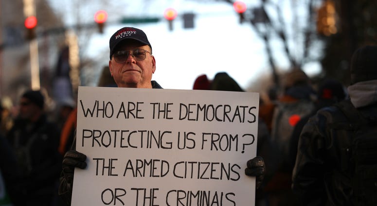 RICHMOND, VIRGINIA - JANUARY 20: Gun rights advocates attend a rally organized by The Virginia Citizens Defense League on Capitol Square near the state capitol building January 20, 2020 in Richmond, Virginia. During elections last year, Virginia Governor