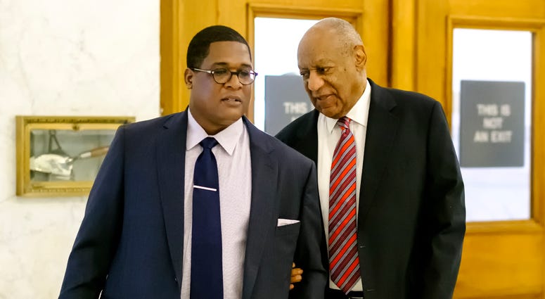 NORRISTOWN, PA - JUNE 7: Actor Bill Cosby (C) and aide Andrew Wyatt (L) arrive for Cosby's trial on sexual assault charges at the Montgomery County Courthouse on June 7, 2017 in Norristown, Pennsylvania. A former Temple University employee alleges that th